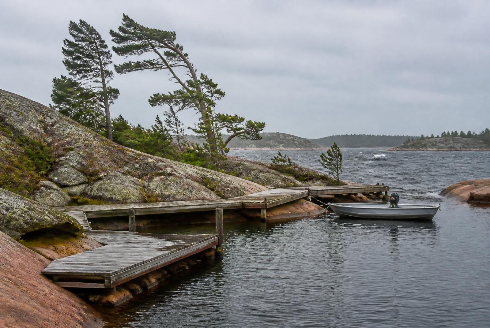 Sheltered rocky harbour and docks at Snug Harbour